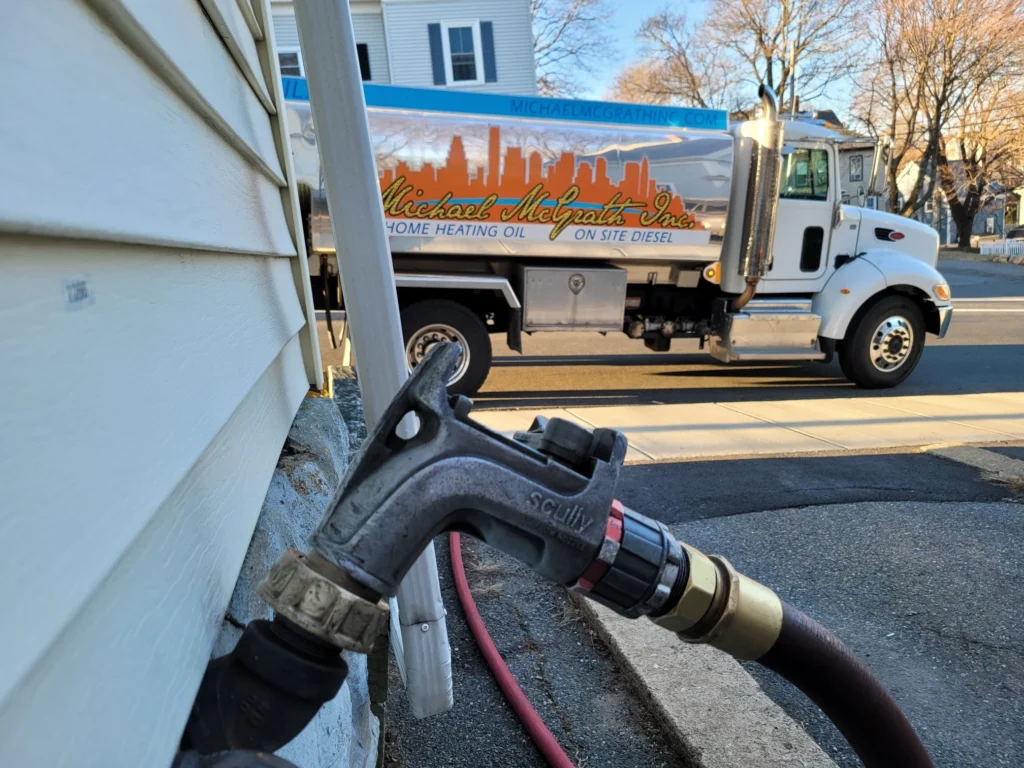 Home Heating Oil Delivery - Pumping Oil into House